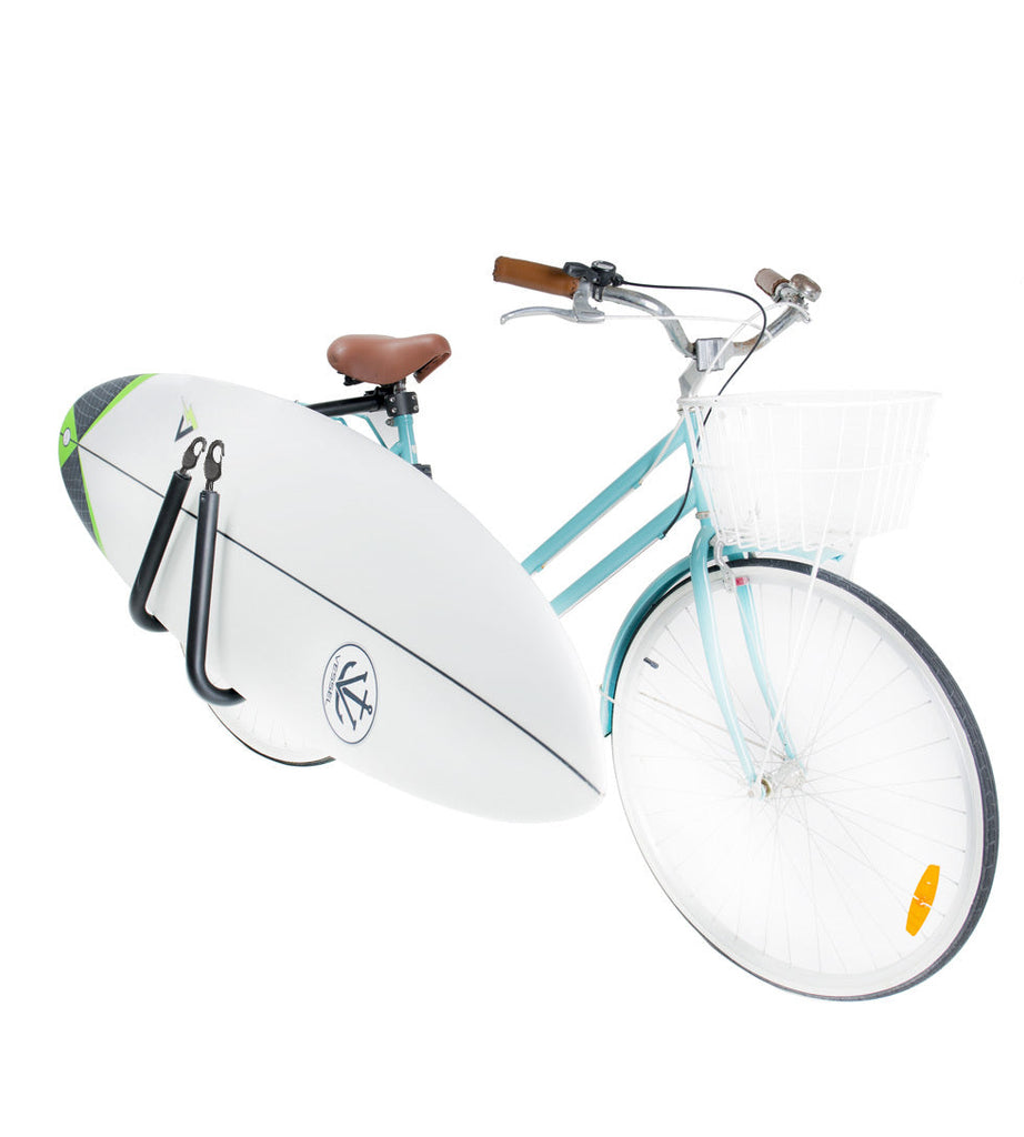 Surfboard bike clearance attachment